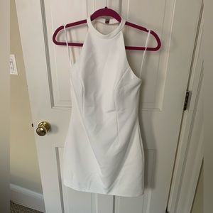 NWT Halston size 6 white halter mini dress. Never worn!!